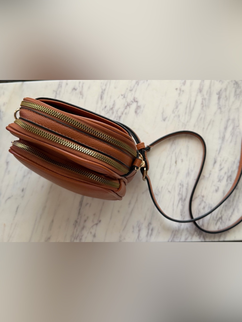 Compact Tan Crossbody Bag with Triple Zip Compartments